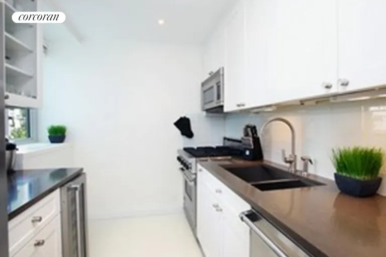 New York City Real Estate | View 200 East 66th Street, C501 | Windowed Kitchen | View 4