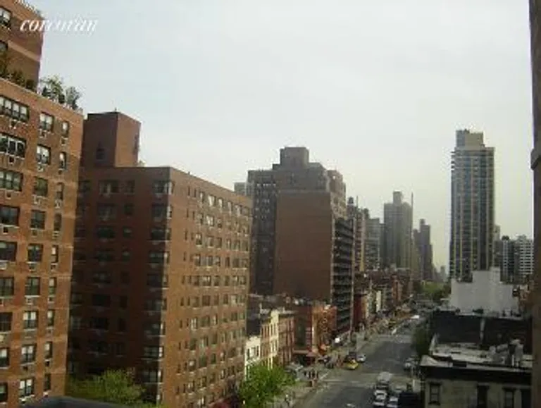 New York City Real Estate | View 301 East 79th Street, 9B | Living Room with Balcony | View 2