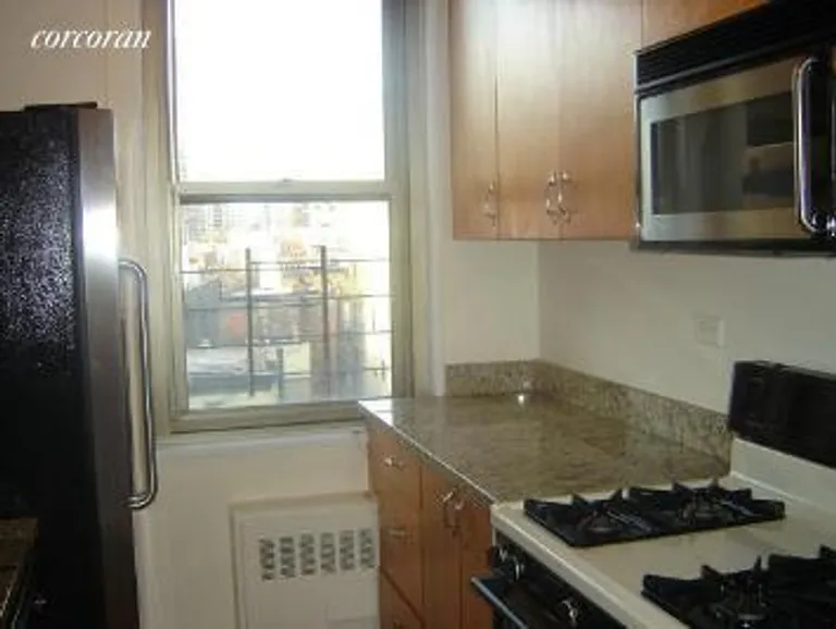 New York City Real Estate | View 301 East 79th Street, 9B | Windowed Kitchen with granite counters | View 3