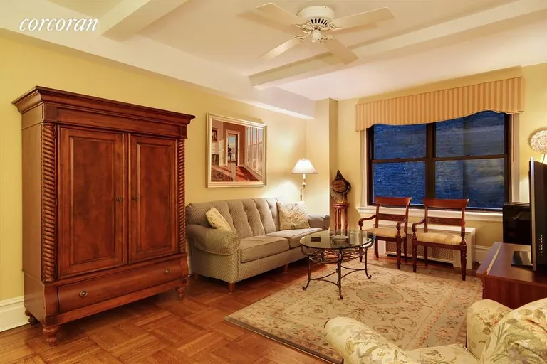 New York City Real Estate | View 235 West End Avenue, 1E | Living room with beamed ceilings, arch | View 2