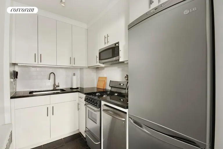 New York City Real Estate | View 77 East 12th Street, 2B | Renovated kitchen with granite and stainless steel | View 3