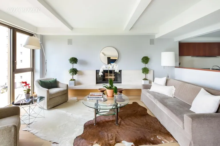 New York City Real Estate | View 50 Gramercy Park North, PARK 12A | Living Room with a wood burning fireplace | View 2