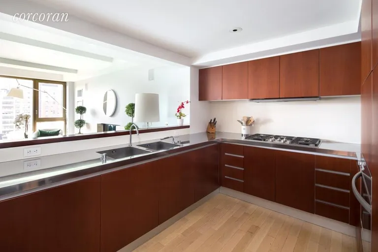 New York City Real Estate | View 50 Gramercy Park North, PARK 12A | Custom Kitchen with Italian lacquered cabinetry | View 3