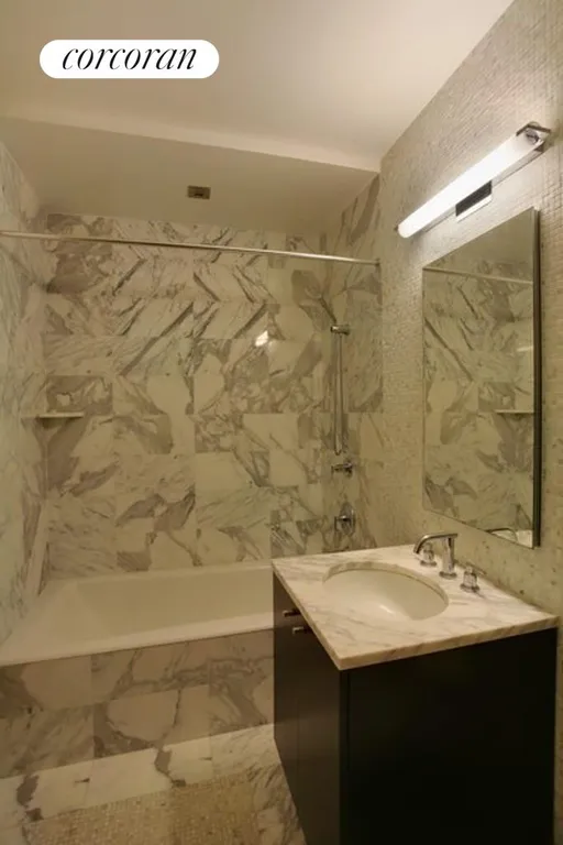 New York City Real Estate | View 46-30 Center Boulevard, 508 | Marble Bathroom | View 5