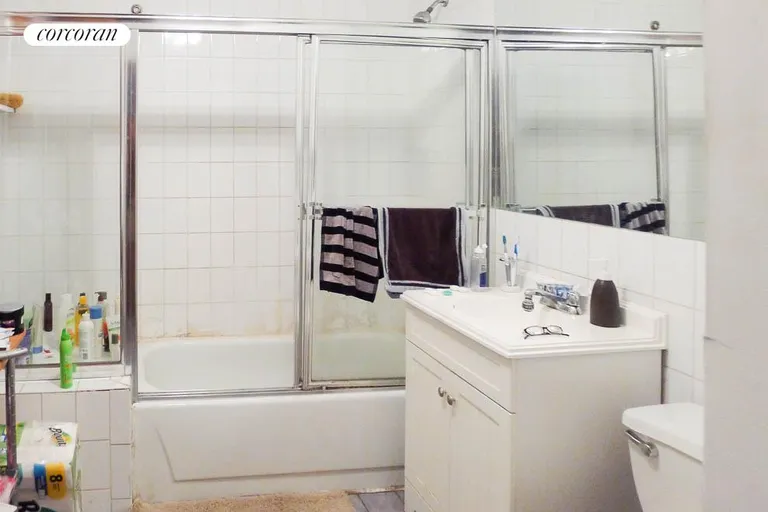 New York City Real Estate | View 2 Lincoln Place, 3R | Bathroom with Washer Dryer | View 7