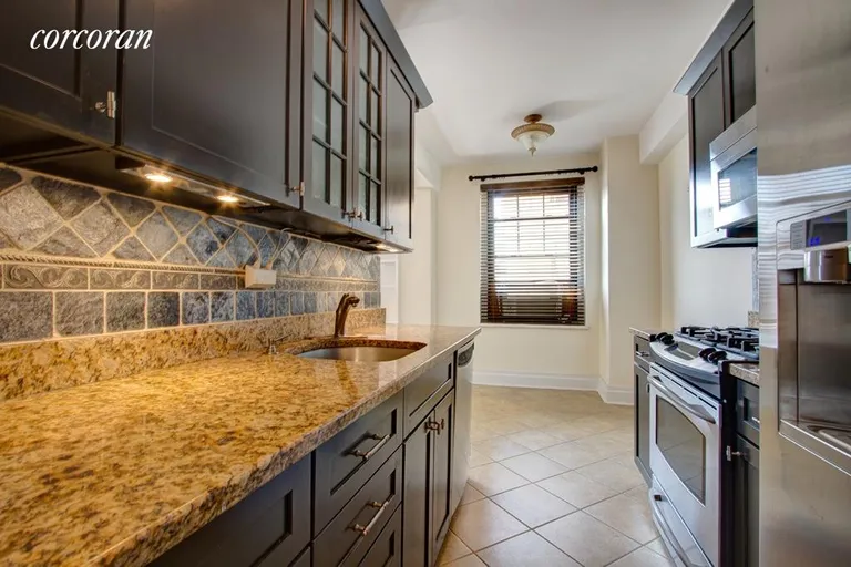 New York City Real Estate | View 172 West 79th Street, 11F | Renovated kitchen with dining area | View 3