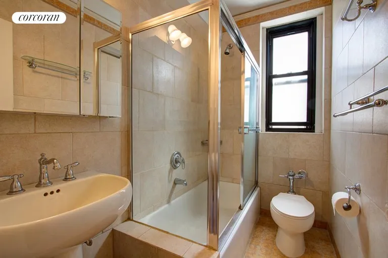 New York City Real Estate | View 172 West 79th Street, 11F | Windowed bathroom with glass enclosed tub/shower | View 4