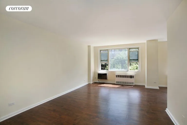 New York City Real Estate | View 1270 Fifth Avenue, 4E | The long living room.  | View 3
