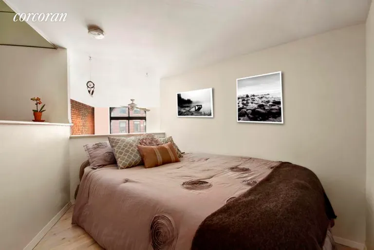 New York City Real Estate | View 77 Bleecker Street, 833N | Bedroom - airy and charming with 6'6" ceilings | View 3