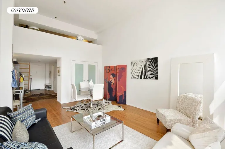 New York City Real Estate | View 67 East 11th Street, 512 | Natural Light Living Room | View 3