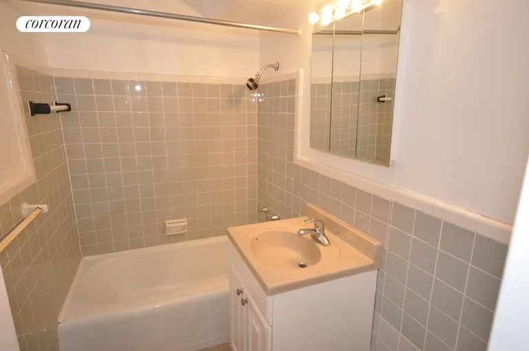 New York City Real Estate | View 191 Willoughby Street, 2D | Tiled Bathroom | View 11