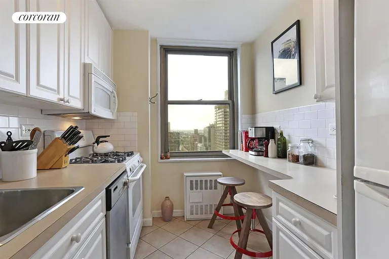New York City Real Estate | View 301 East 79th Street, 24J | Windowed Kitchen | View 6