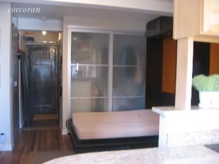 New York City Real Estate | View 45 Tudor City Place, 1020 | Queen size Murphy Bed, open | View 3