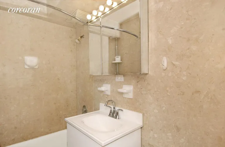 New York City Real Estate | View 153 East 57th Street, 16H | marble bath | View 7