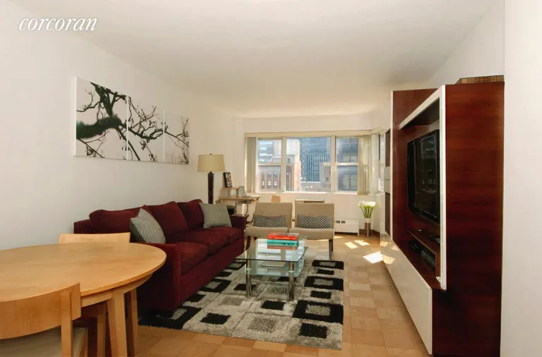 New York City Real Estate | View 153 East 57th Street, 16H | south facing living room with abundant direct sun | View 2