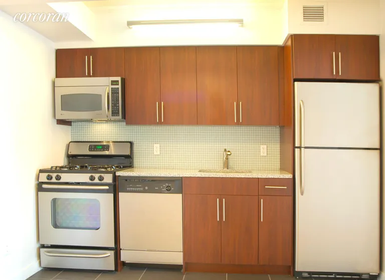 New York City Real Estate | View 555 West 23rd Street, N9G | Modern, functional cooking at your fingertips! | View 2