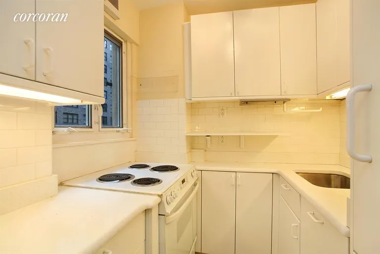 New York City Real Estate | View 232 East 58th Street, 3 FL | Kitchen - Granite Counters & High End Appliances | View 2