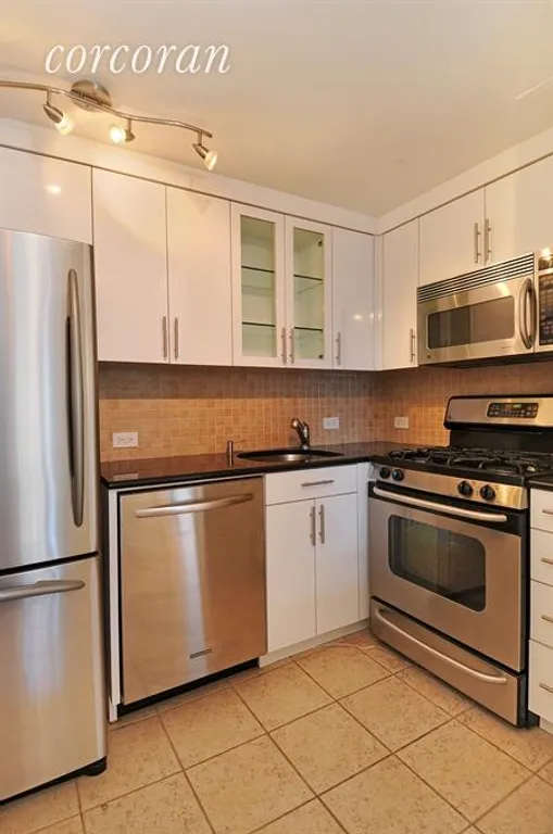New York City Real Estate | View 188 East 70th Street, 24B | Kitchen | View 2