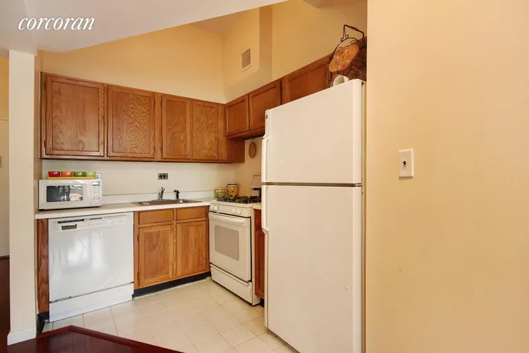New York City Real Estate | View 77 Bleecker Street, 917N | Kitchen opens out to dining area. | View 2