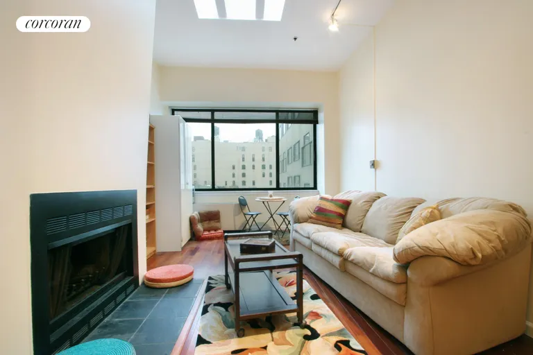 New York City Real Estate | View 77 Bleecker Street, 917N | Fireplace, huge window & southern exposure.  | View 5