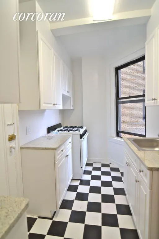 New York City Real Estate | View 201 West 77th Street, 14A | Windowed kitchen | View 3