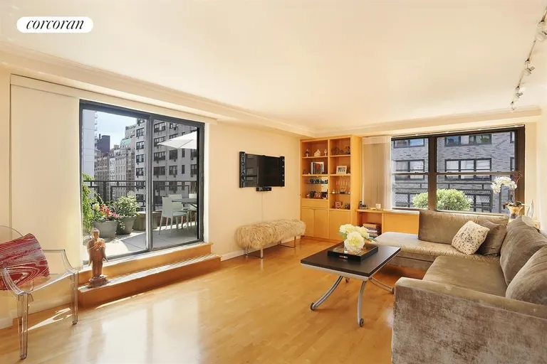 New York City Real Estate | View 225 East 57th Street, 11M | Sundrenched Living Room | View 2