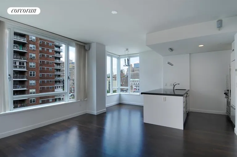 New York City Real Estate | View 261 West 28th Street, 10A | Corner dining area with open views | View 4