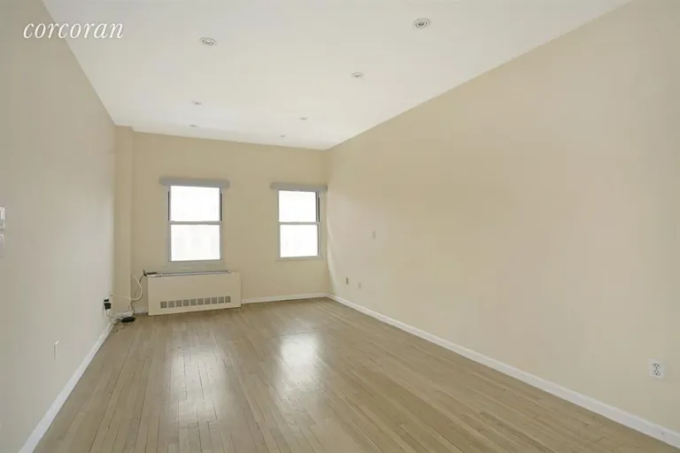 New York City Real Estate | View 186 West 80th Street, 4E | Sunny Living Room with Western Views | View 2