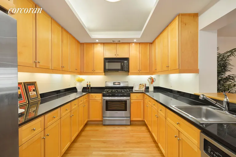 New York City Real Estate | View 53 North Moore Street, 5F | Kitchen with Pass-Thru Bar | View 3