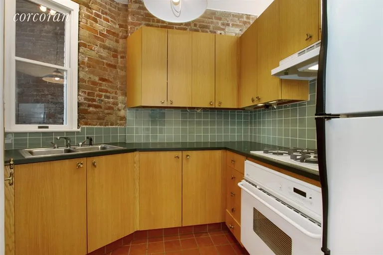 New York City Real Estate | View 225 East 4th Street, 20 | Windowed kitchen. | View 2