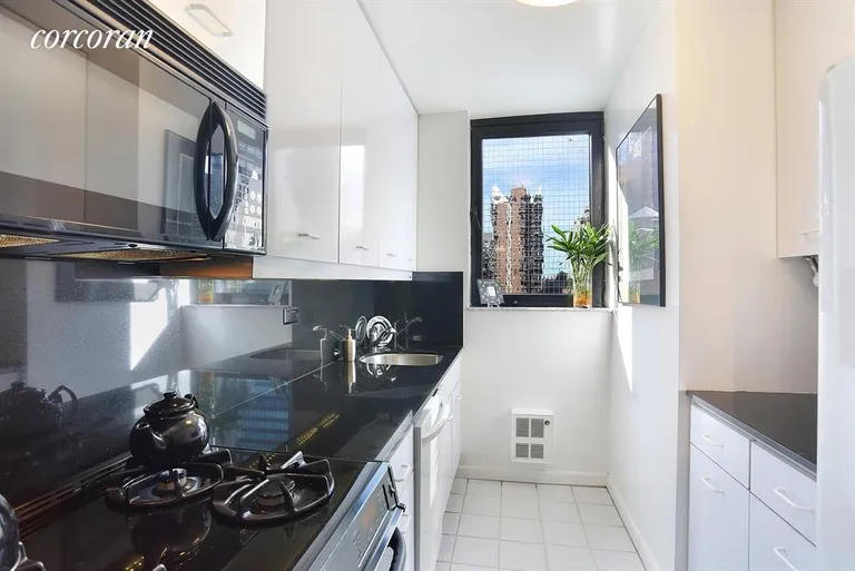 New York City Real Estate | View 255 East 49th Street, 15E | Kitchen | View 4