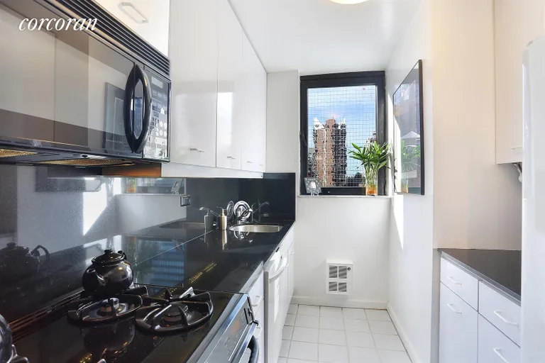 New York City Real Estate | View 255 East 49th Street, 15E | Kitchen | View 11