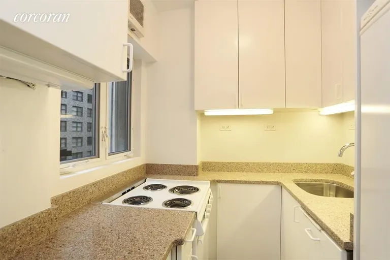New York City Real Estate | View 232 East 58th Street, 4 | Ceaser stone Countertops and DW | View 2