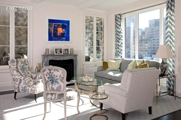 New York City Real Estate | View 116 East 63rd Street, 8D | Living Room with Open Southern View | View 2
