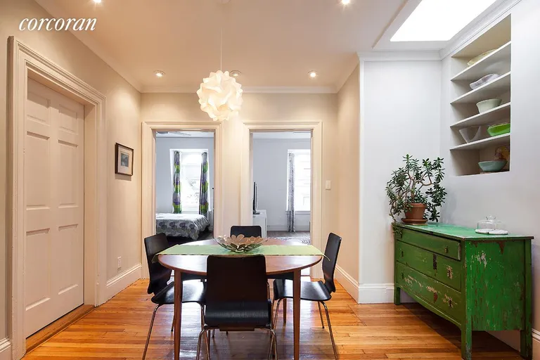 New York City Real Estate | View 289 Henry Street, 4 | Central dining area with skylight. | View 5