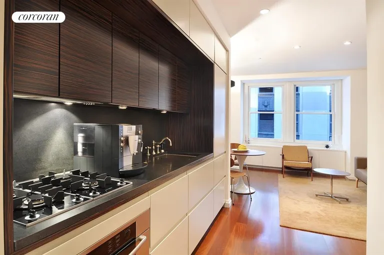 New York City Real Estate | View 55 Wall Street, 820 | Elegant zebrawood/granite kitchen | View 2