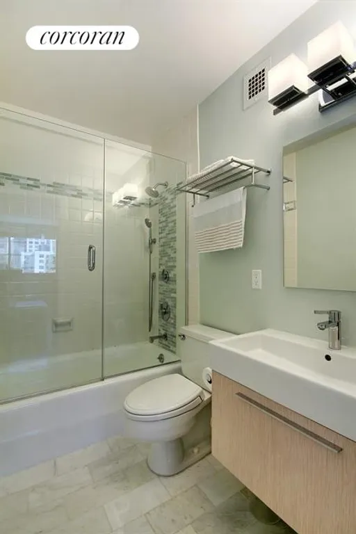 New York City Real Estate | View 1725 York Avenue, 18H | Stunning Master Bathroom | View 5