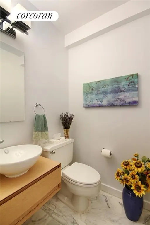 New York City Real Estate | View 1725 York Avenue, 18H | Newly Renovated Power Room | View 6