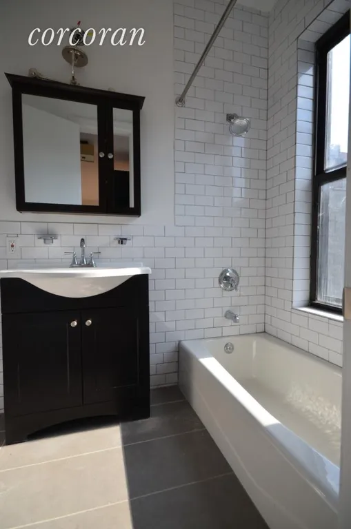 New York City Real Estate | View 206 Thompson Street, 13 | Windowed Bath | View 3