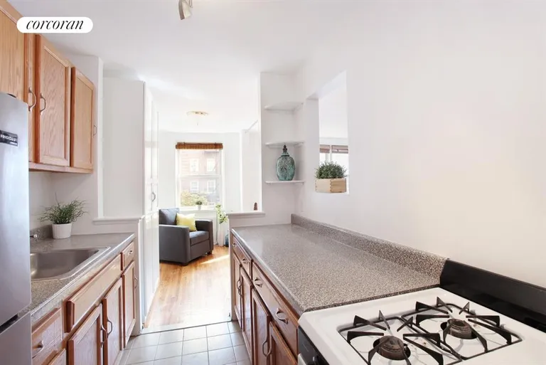 New York City Real Estate | View 400 East 17th Street, 308 | Plenty of counter space w/ this pass thru kitchen | View 2