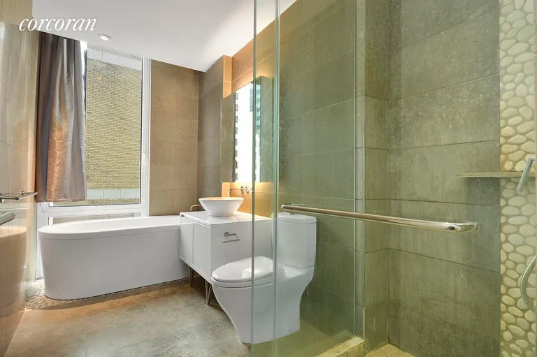 New York City Real Estate | View 247 West 46th Street, 1205 | Beautiful spa-like bathroom | View 2