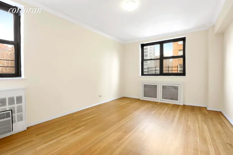 New York City Real Estate | View 305 East 72Nd Street, 5DN | Large Bedroom With Double Exposure | View 2
