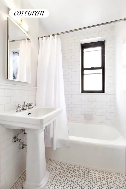 New York City Real Estate | View 305 East 72Nd Street, 5DN | Windowed Renovated Bathroom | View 4