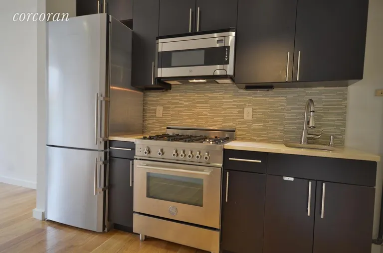 New York City Real Estate | View 206 Thompson Street, 11 | Brand New Galley Kitchen! | View 3