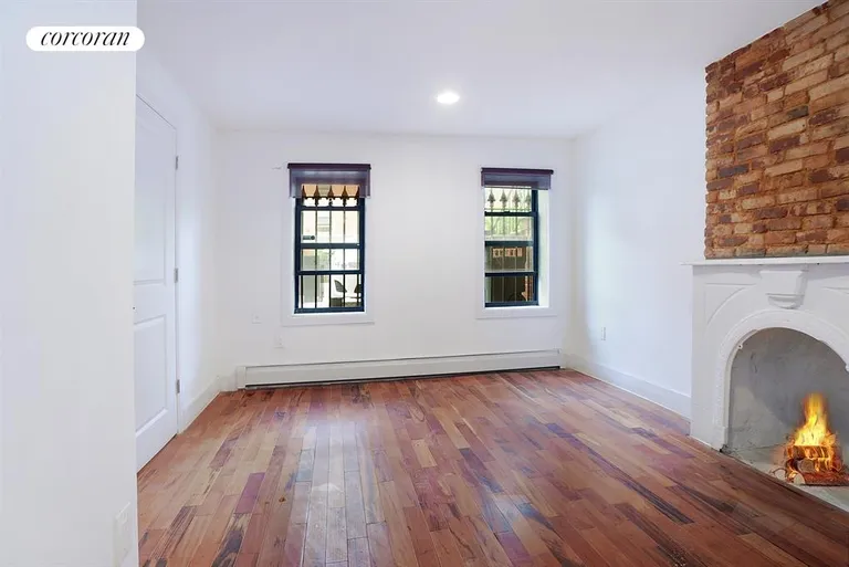 New York City Real Estate | View 25 Moffat Street, lower | Living Room | View 2