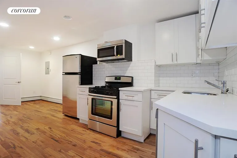 New York City Real Estate | View 25 Moffat Street, lower | Kitchen | View 3