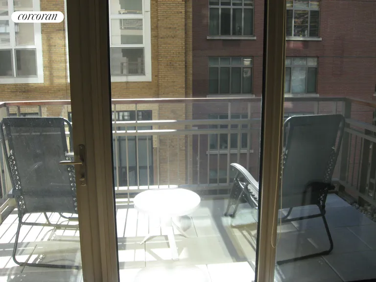 New York City Real Estate | View 124 West 23rd Street, 6C | Sun flooded Balcony | View 2
