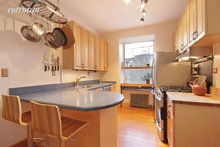New York City Real Estate | View 300 West 109th Street, 5J | Renovated Kitchen with Breakfast Bar | View 2