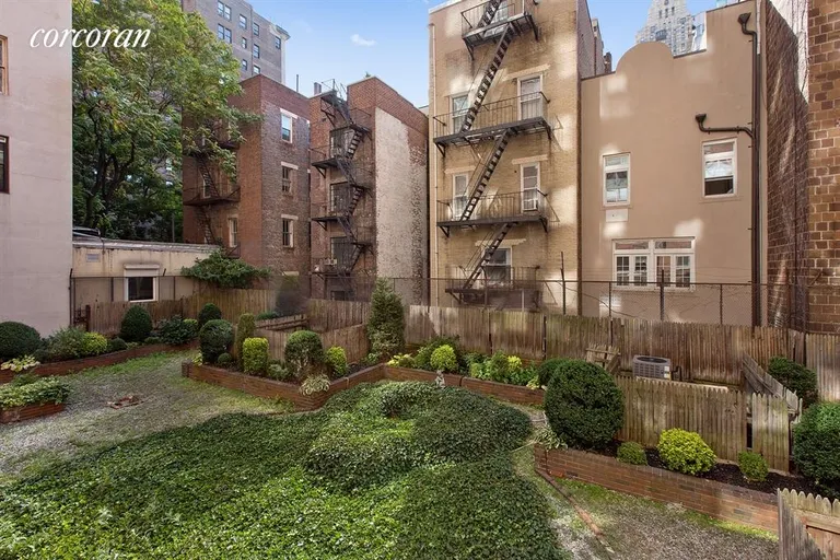 New York City Real Estate | View 50 East 79th Street, 3F | Garden & sky from the living room window... | View 2