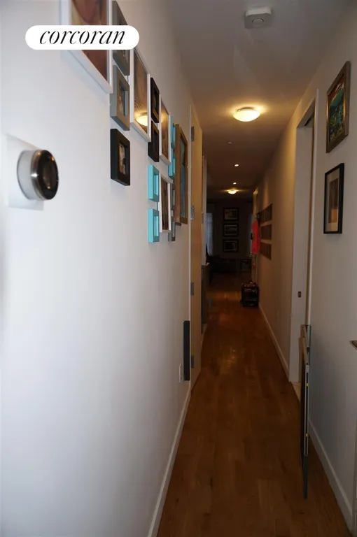 New York City Real Estate | View 233 Kent Avenue, 3 | Hallway (NEST System control panel) | View 8